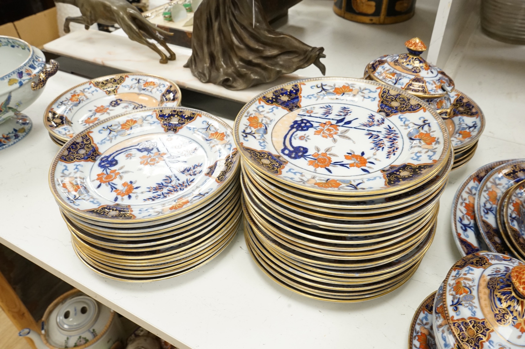 A Victorian Davenport dinner service to include tureens, dinner plates and soup bowls, largest 52cm wide